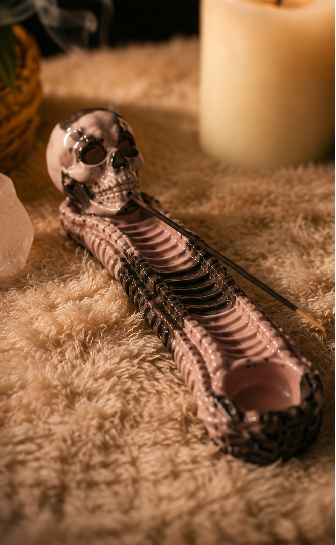 A decorative skull-shaped incense holder with a rib cage design, shown in a warm, atmospheric setting with candles, incense sticks, and a hand lighting the holder. The image is a three-panel collage.